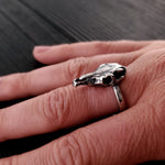 My horse skull ring is cast in silver plated bronze, oxidized in the recesses. It measures a mere 15/16" (24mm) long and 3/8" (10mm) at its widest point. It displays excellent refined design including the tiny incisors and molars.